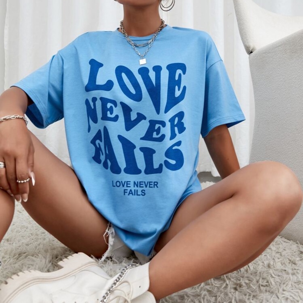 SHEIN Blue "Love Never Fails" Graphic Tee